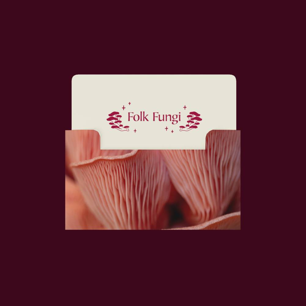 A gift card with the "Folk Fungi" logo in a card sleeve featuring pink oyster mushrooms.