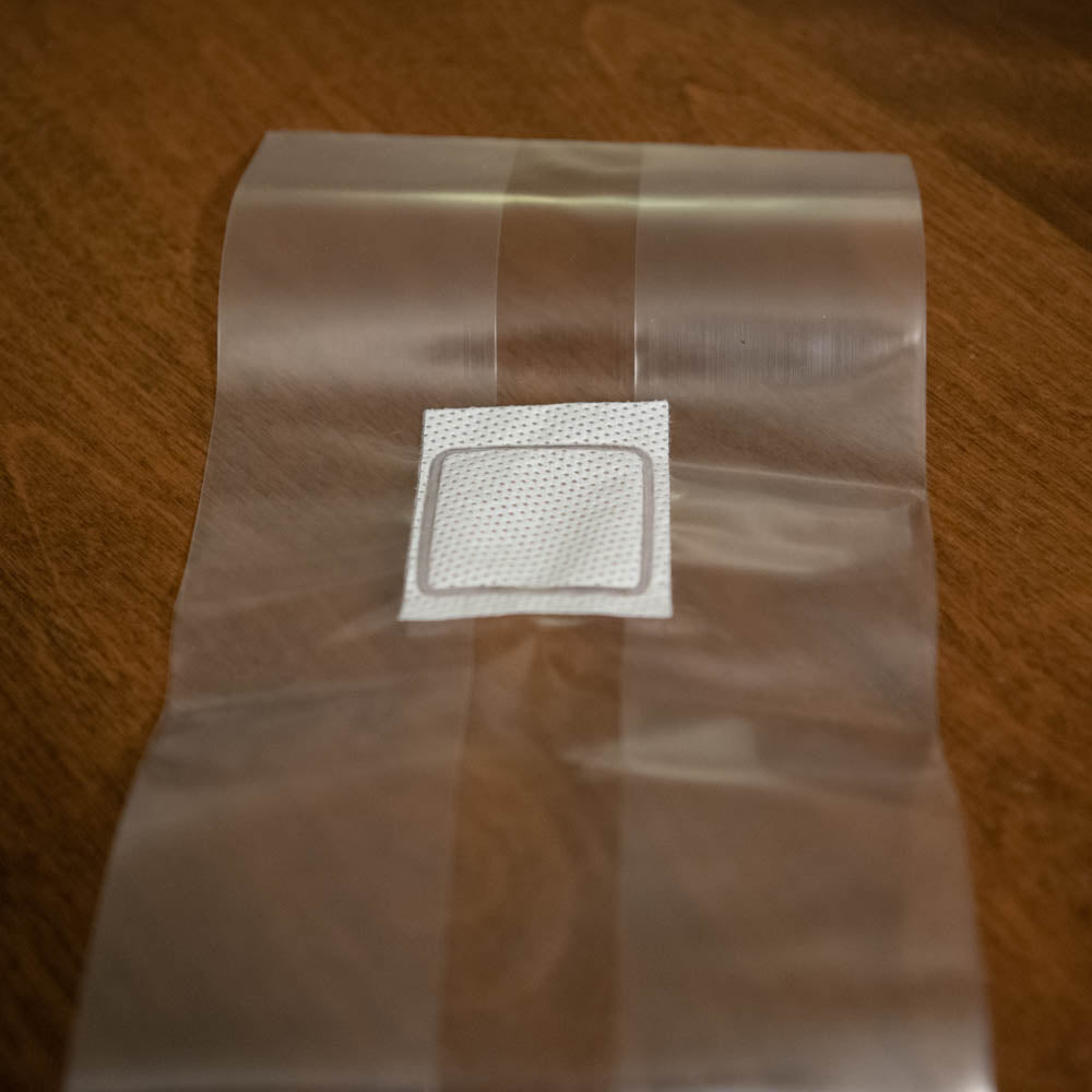 A mushroom grow bag on a table.